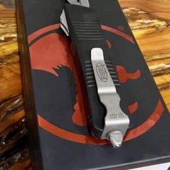 Budget π Microtech Troodon D/E OTF Automatic Knife (3" Apocalyptic) 138-10AP β 7 Microtech Troodon D/E OTF Automatic Knife (3